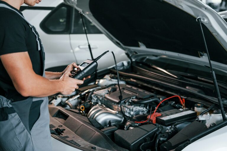 Professional performing vehicle diagnostics in Perth for Platinum Calibrations, WAs leading calibration service.