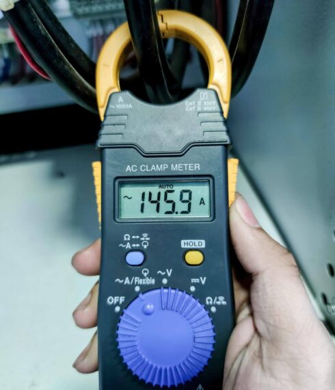 Precision AC clamp meter in use by Platinum Calibrations, expert calibration services in Perth and WA